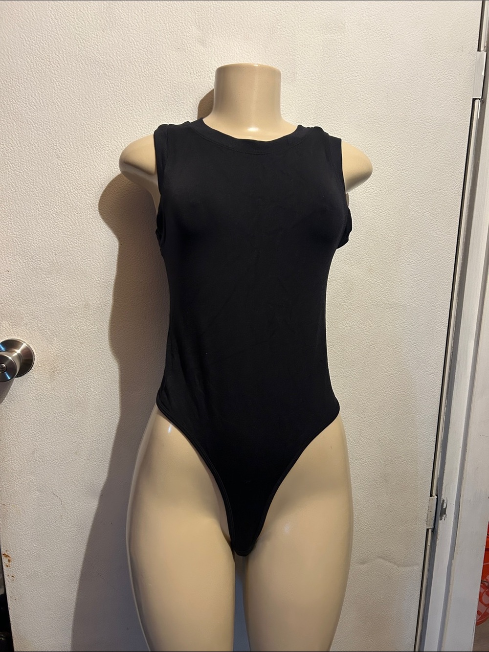 Women’s Black Sleeveless Bodysuit with Crew Neck